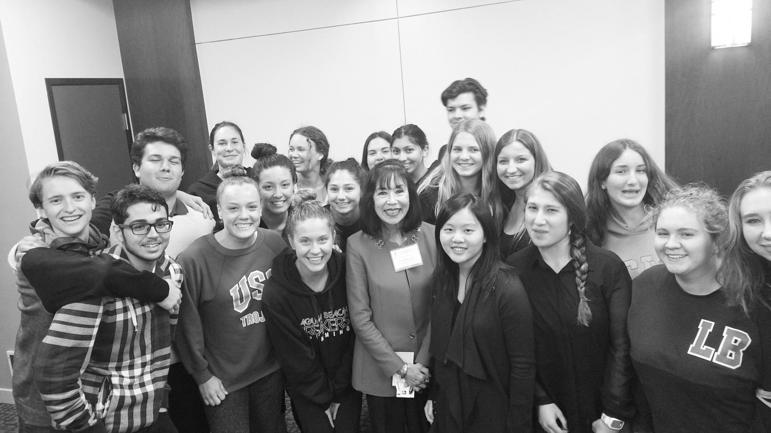 APUSH students gather with Karen Korematsu after the presentation. Students were encouraged to enter the competition for personal experience and the chance to learn more about democracy, the legal system and the reality about Japanese internment.