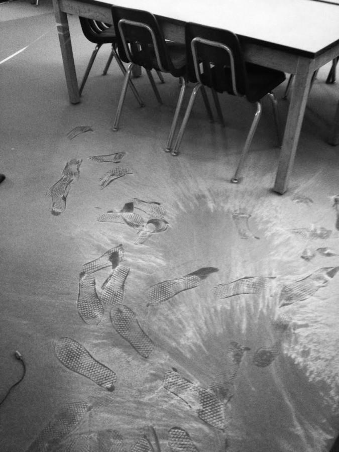 An anonymous group vandalizes science classrooms room 61 and 62 leaving a snow like blanket of fire retardant laying everywhere. Authorities responded to the vandalism with a full scale investigation. 
