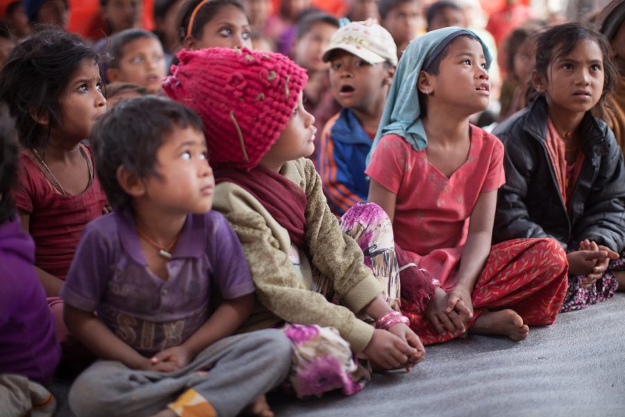 At a school just outside of Kathmandu, Nepal, there is no chalkboard, furniture, or even walls. These children attend a school where they sit on a large piece of plastic located near a brick factory, where their parents work. 