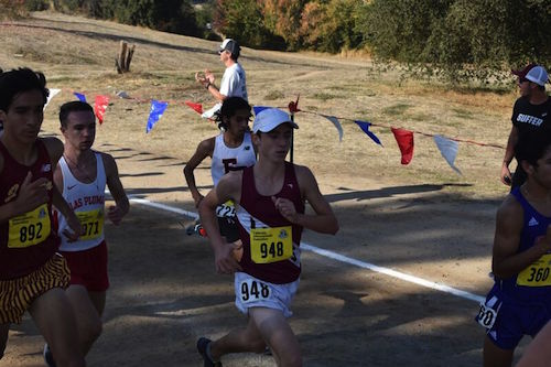 Ryan Smithers gives it his all as he pushes to the front of the pack in the Division IV boys race at Woodward Park. 