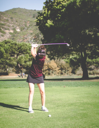 Claire Smithers swings at Ben Browns during a match. She has had an incredible season, taking charge as a teammate.