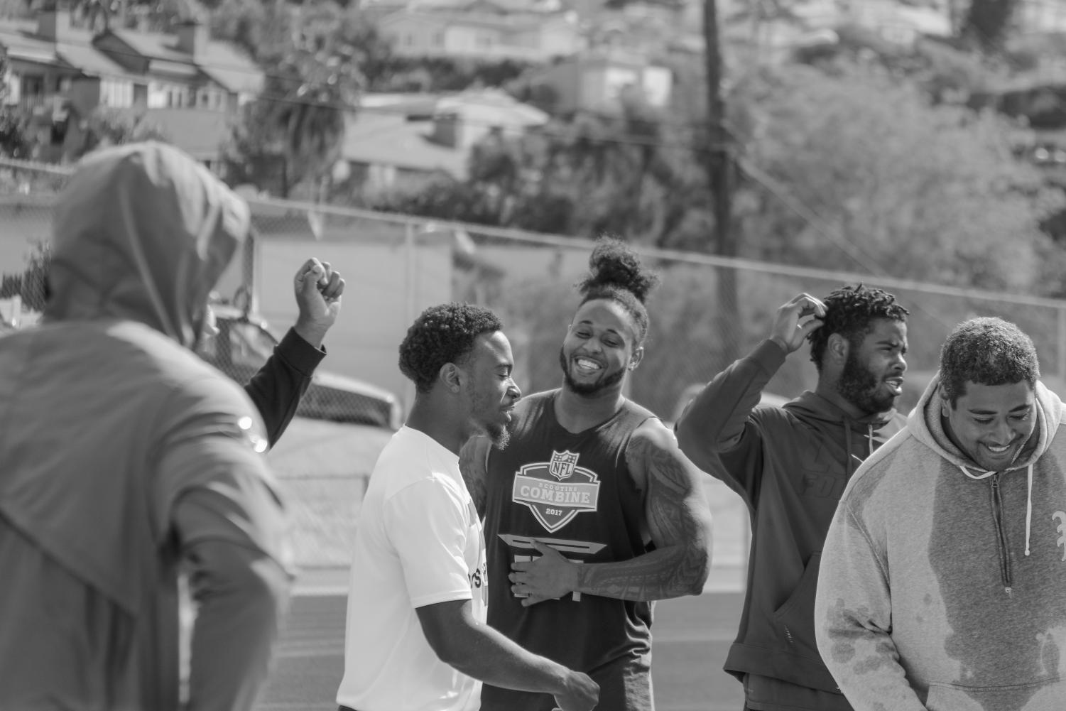 Potential NFL athletes train on the LBHS track for the upcoming NFL tryouts. They have been training for three weeks and have around five weeks left on our campus