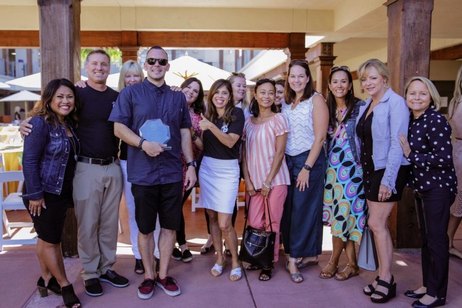 
Brandon Lee receives his Spirit of Laguna Award. (Left to right) El Morro School Counselor Marlanne Lawson, EMS Principal Chris Duddy, LBUSD Director of Special Education Irene White, Lead Instructional Aide Brandon Lee, Special Education Instructional Aide Elizabeth Murray, EMS School Psychologist Luisa Mossa, Special Education IA Eva Boni, Special Education IA Agnus McManus, Special Education Teacher Nedan Sullivan, Special Education Teacher Alicia Saucedo, School Readiness Nurse Claudette Ahern, Speech and Language Pathologist Tracy Slater, Early Learning Specialist Sandra Bandettini.
