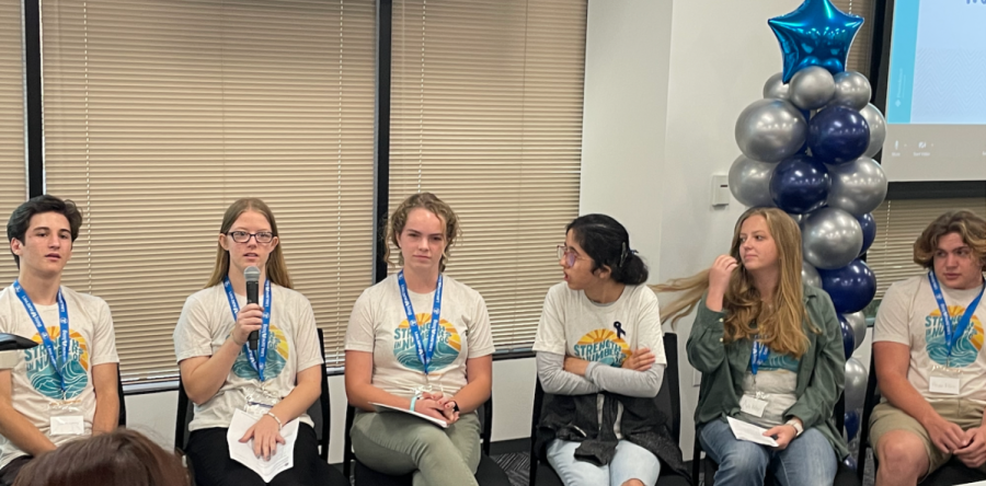 Senior Miranda Hartley sits among her Strength in Numbers peers as they speak at the annual   
Orange County Substance Abuse Prevention Symposium.