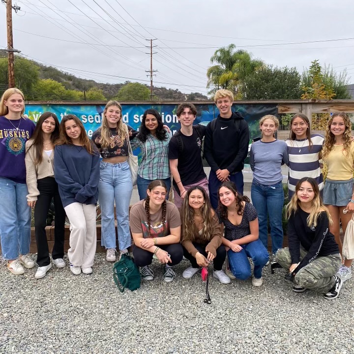 FLOW Club members visit the Pacific Marine Mammal Center. They focus on helping keep our community clean and environmentally friendly.
