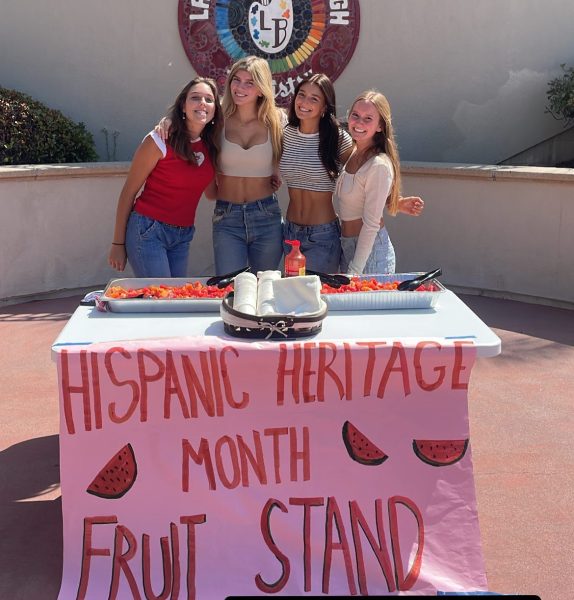 Four ASB members pose for a photo at the Hispanic Heritage Month fruit stand last October. ASB collaborated with LBHS Persian Club this month to bring more awareness to their culture club.
(Left to Right: Hayes Frith, Cady Dartez, Chloe Oloughlin, Riley Beason) 
