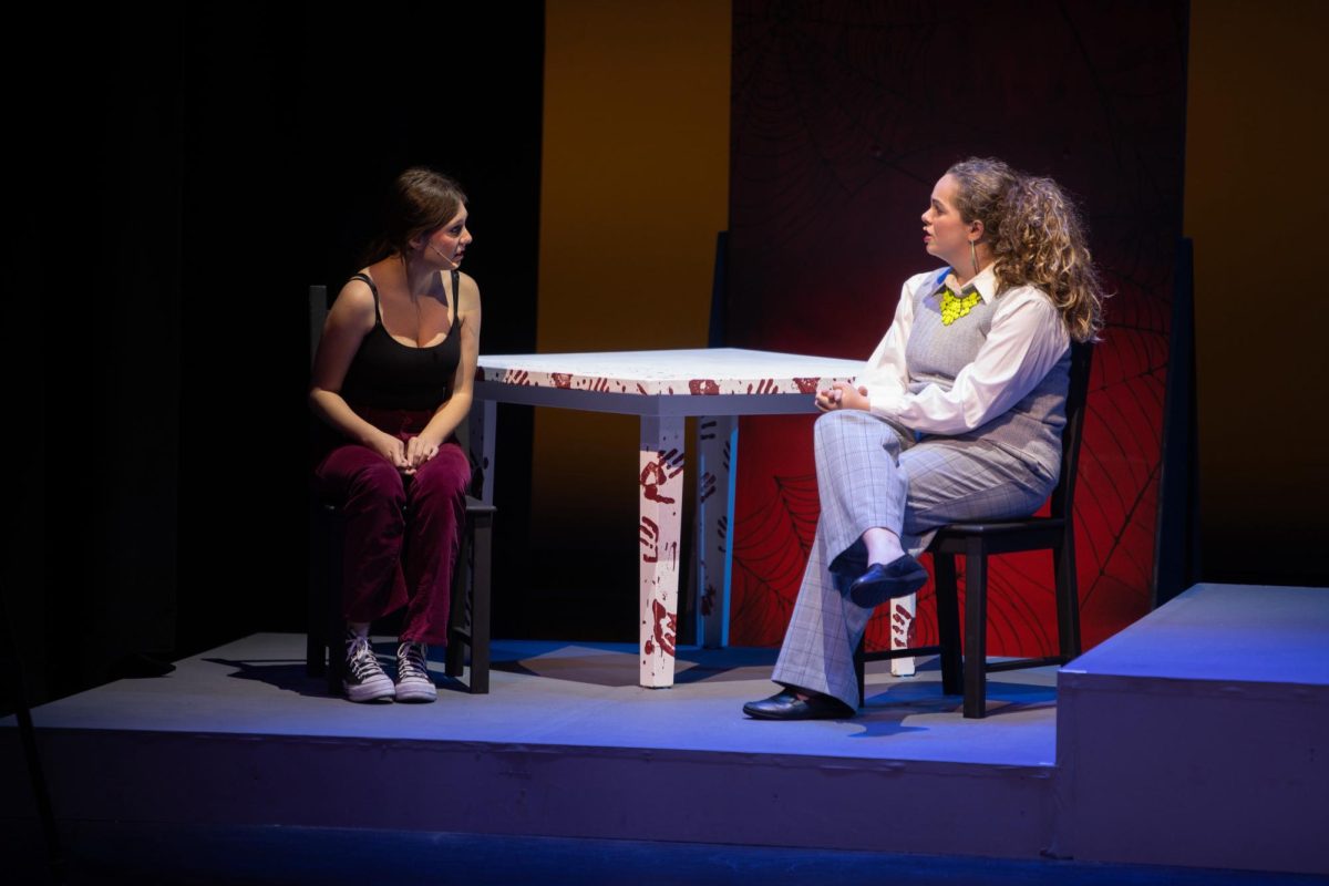 (Photo credit by LBHS Theatre)

Arianna Cunningham and Mallory Keller share a concerned look for one another discussing an intense situation. The two actresses had been working behind the curtains building a storyline between each other’s characters to craft a bonded connection. 
