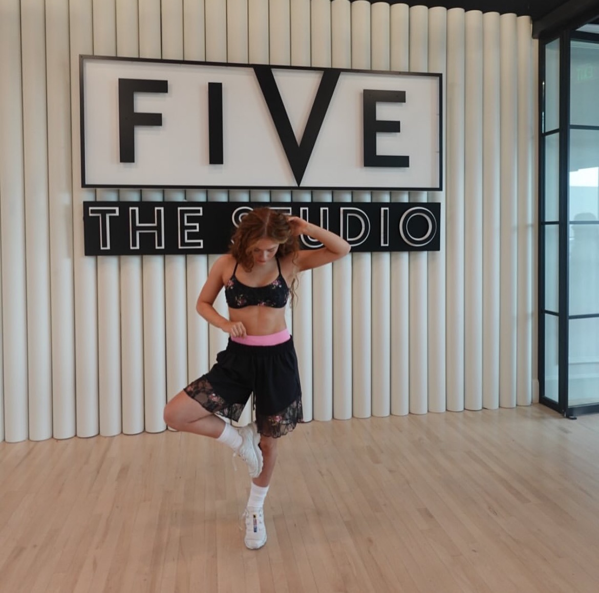 Delaney showing off some items for Five DanceWear