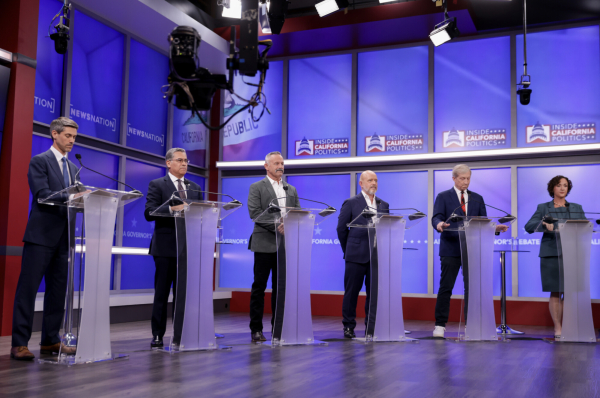From left, California gubernatorial candidates Matt Mahan, Xavier Becerra, Chad Bianco, Steve Hilton, Tom Steyer and Katie Porter participate in a debate at KRON Studios in San Francisco on April 22, 2026. California’s primary is June 2, with the top two finishers advancing to the November general election regardless of party affiliation. (Jason Henry/Nexstar/Bloomberg)